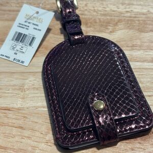 Michael Kors oxblood Luggage Tag with Gold Logo